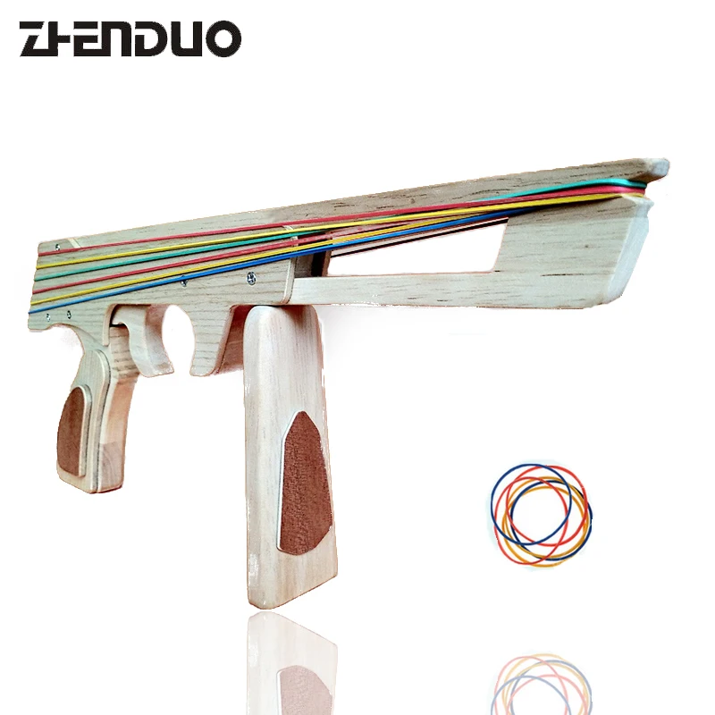 

1Pc/set Bullet Rubber Band Launcher Wooden Gun Hand Pistol Guns Shooting Slingshot Toy Gifts Boys Fun Sports For Kids Outdoor