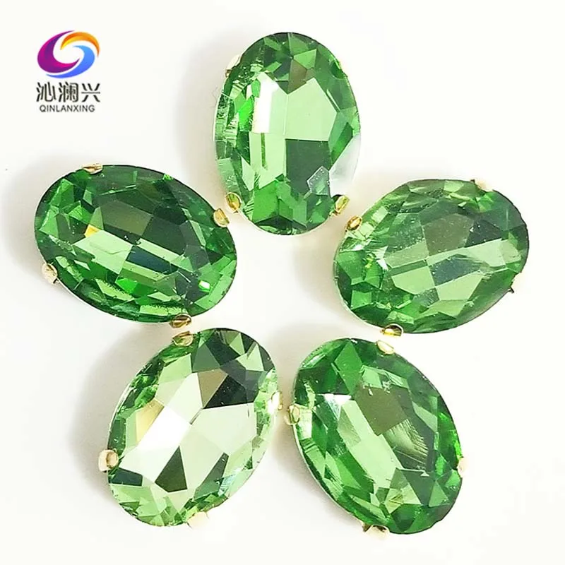 

Light Green Oval Shape High Quality Glass Crystal Sew on Stones,golden Bottom Claw Rhinestone,Diy/Clothing Accessories SWTG16