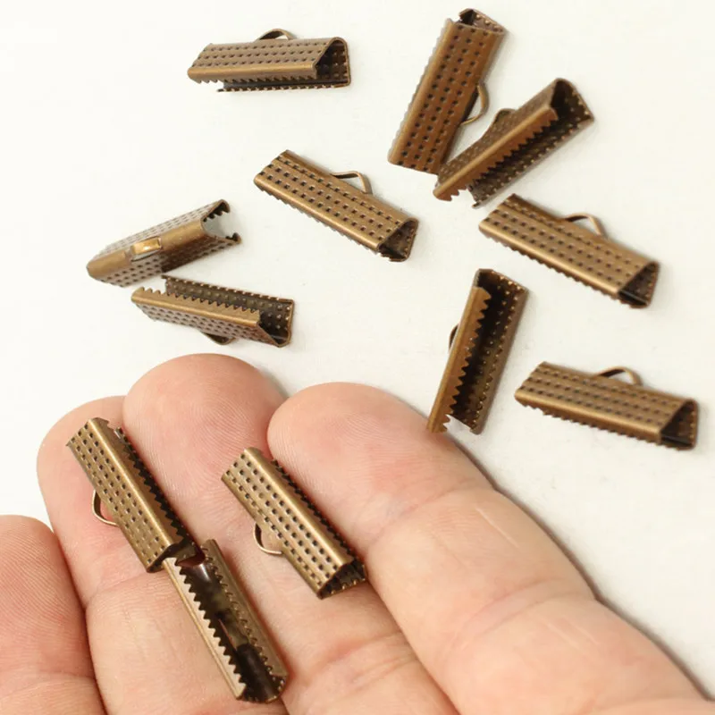 25 Pc Antique Bronze Ribbon Crimp Ends Clasp.(19mm) CLS7in Jewelry