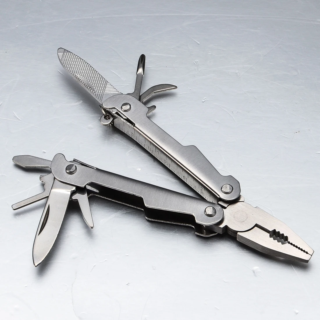 

Multifunction Folding Plier Mini stainless steel PortableKnife Keychain Screwdriver Camping Hiking Survival Tools