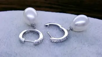 

charming 10-11 mm white baroque pearl earring