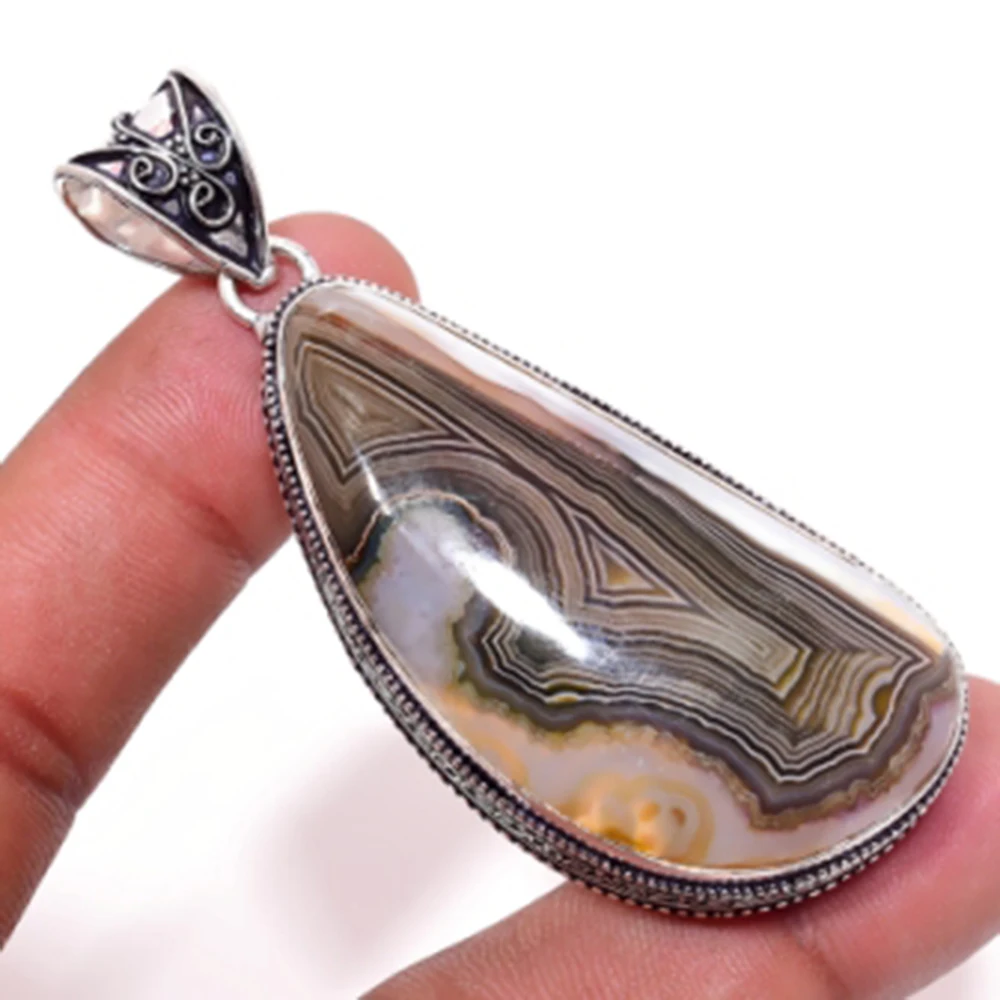 

Crazy Lace Agates Pendant Silver Overlay over Copper , 70mm, P6501
