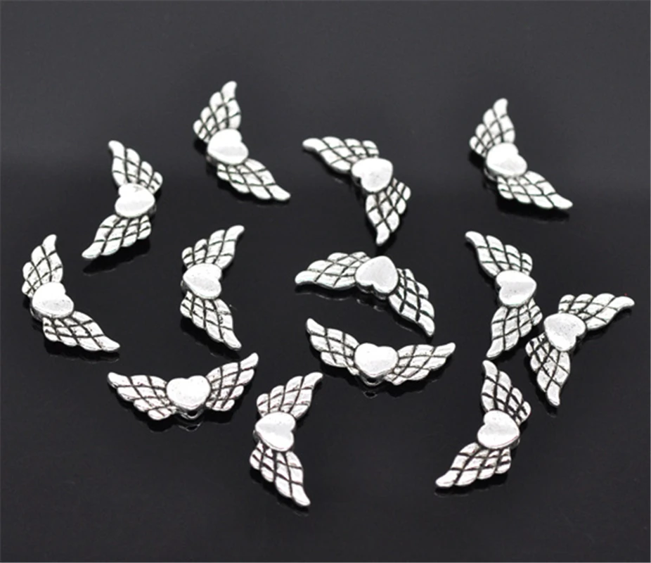 DoreenBeads 50 сердечко серебряного цвета &amp разделитель &quotкрылья&quot Beads 22x9 мм (B13230)