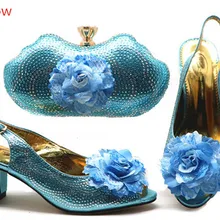 light blue shoes and matching bag