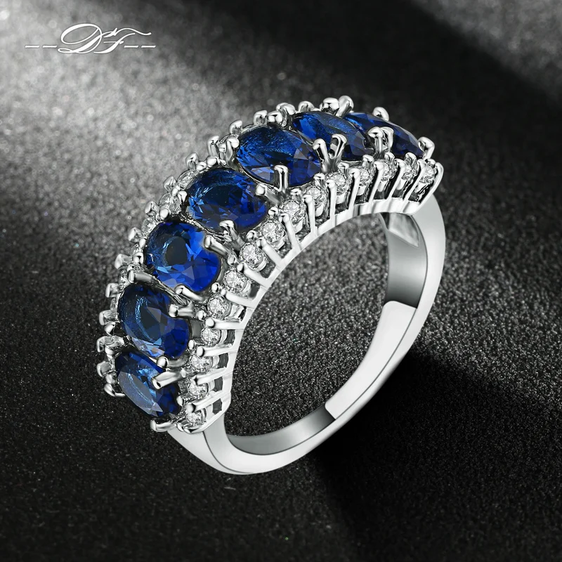 Кольцо с синим камнем серебро. Кольцо с голубым камнем. Кольцо серебро с синим камнем. Кольцо с синим камнем. Кольцо серебро с сапфиром и цирконом.