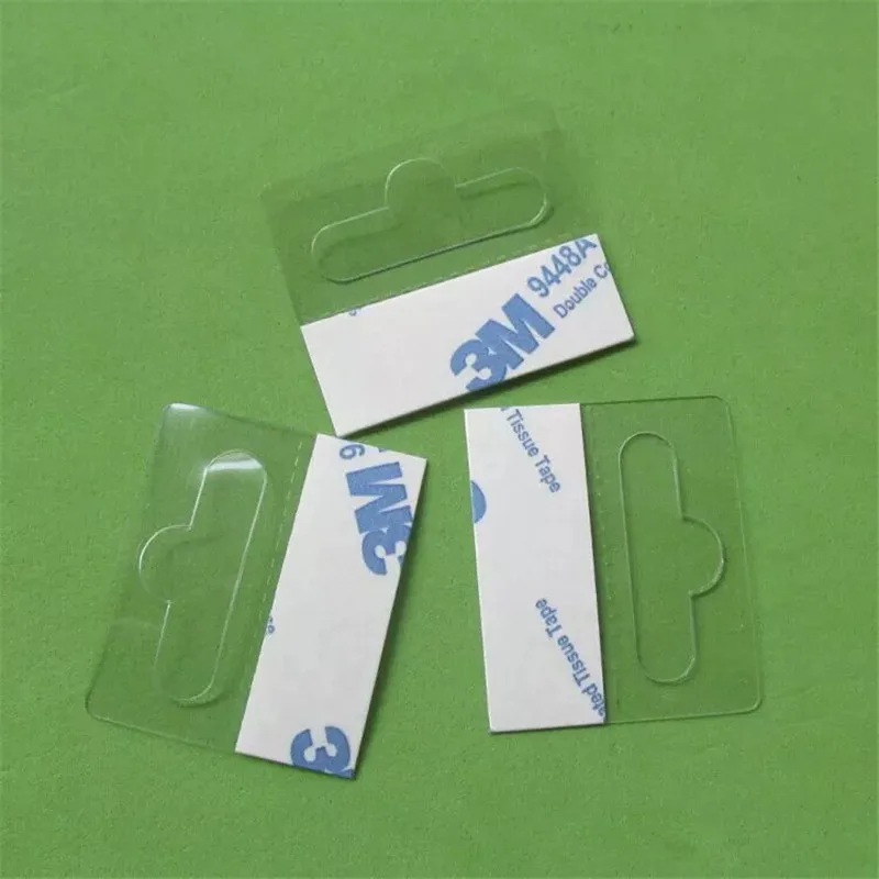 

Self-adhesive Merchandising Hang Tabs Hole Bulk, box bag package PET PVC hangers peghook, plastic display reinforced tag