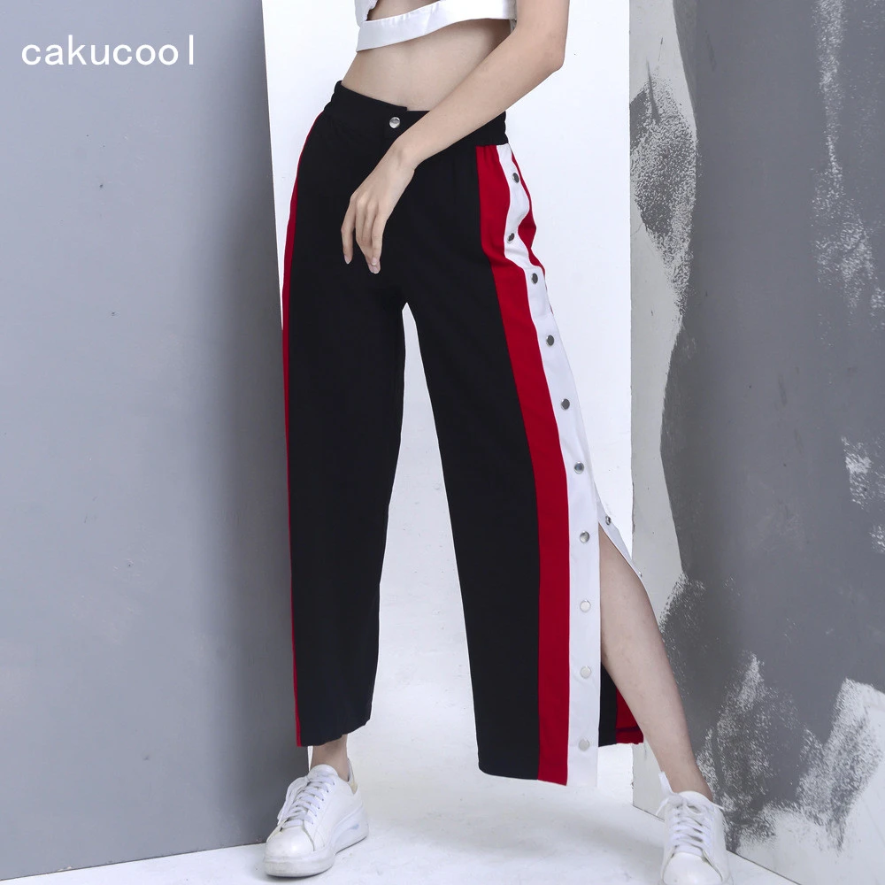 black pants with red and white stripe