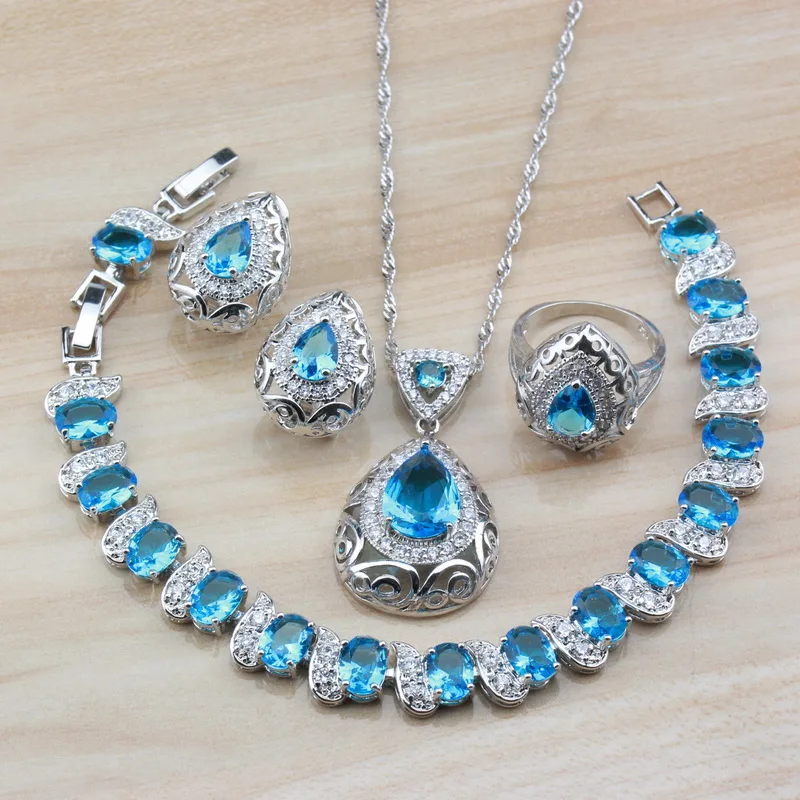 

Sky Blue Crystal 925 Sterling Silver Water Drop Hollow Party Jewelry Set Dangle Clip Earrings/Necklace/Bracelet/Ring For Women