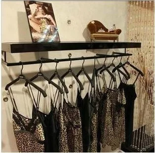 Clothing store renovation renderings on display shelf