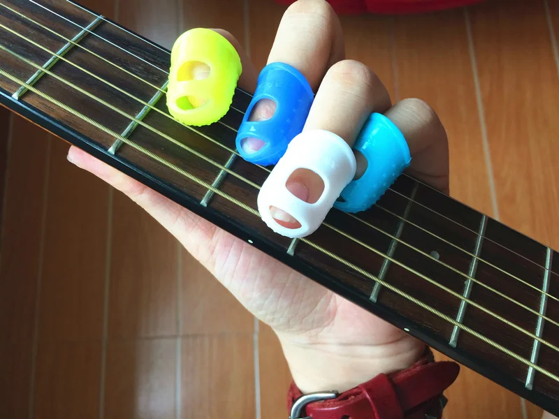 Buy New 4pcs/set Wearable Celluloid Silica gel Guitar