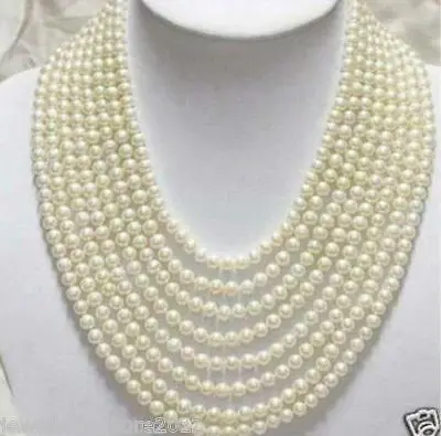 

FREE SHIPPINGBeautiful 8 Rows 6-7mm White Freshwater Pearl Necklace AAA