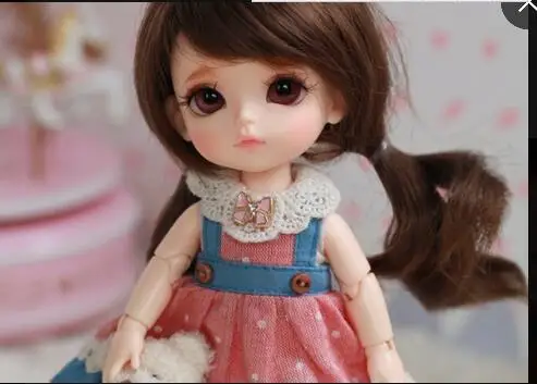 

Free shipping bjd 1/8 dolls yellowW Happy with eyes