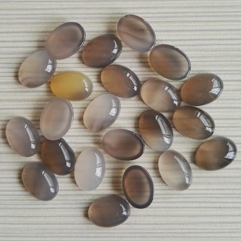 

Wholesale hot selling natural gray onyx stone beads 10X14mm oval shape CAB CABOCHON stone beads 50pcs/lot Free shipping