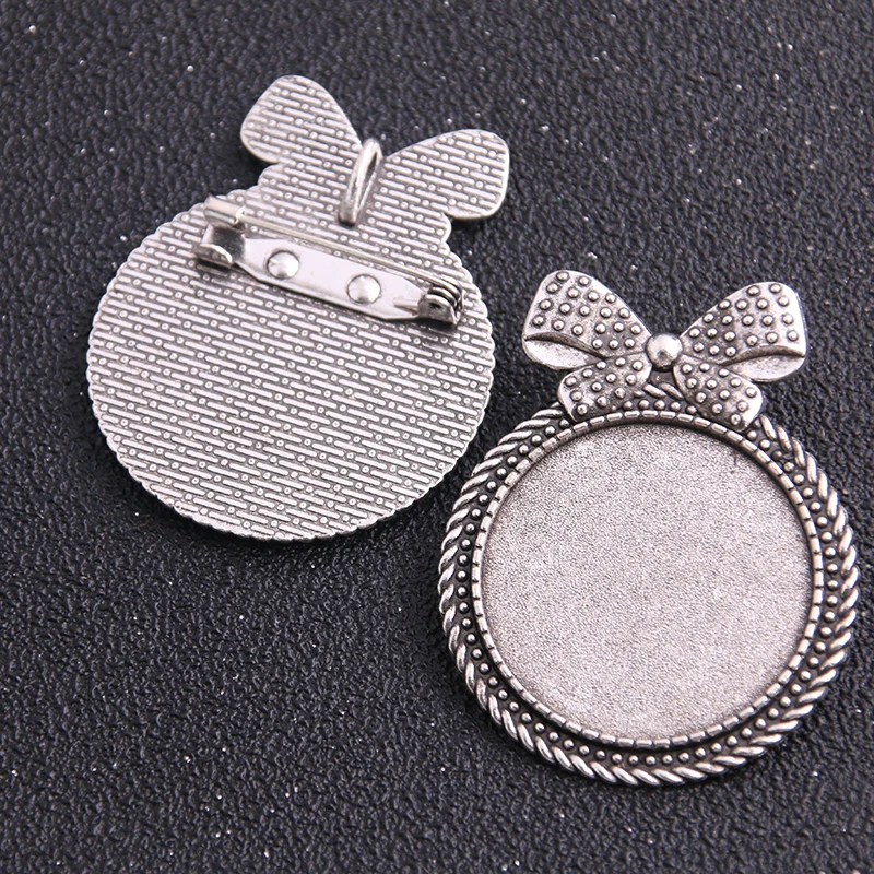 

1pieces/lot Antique Silver Metal Cameo Bowknot 38*49mm(Fit 30mm dia) Round Cabochon Brooch+Pendant Setting