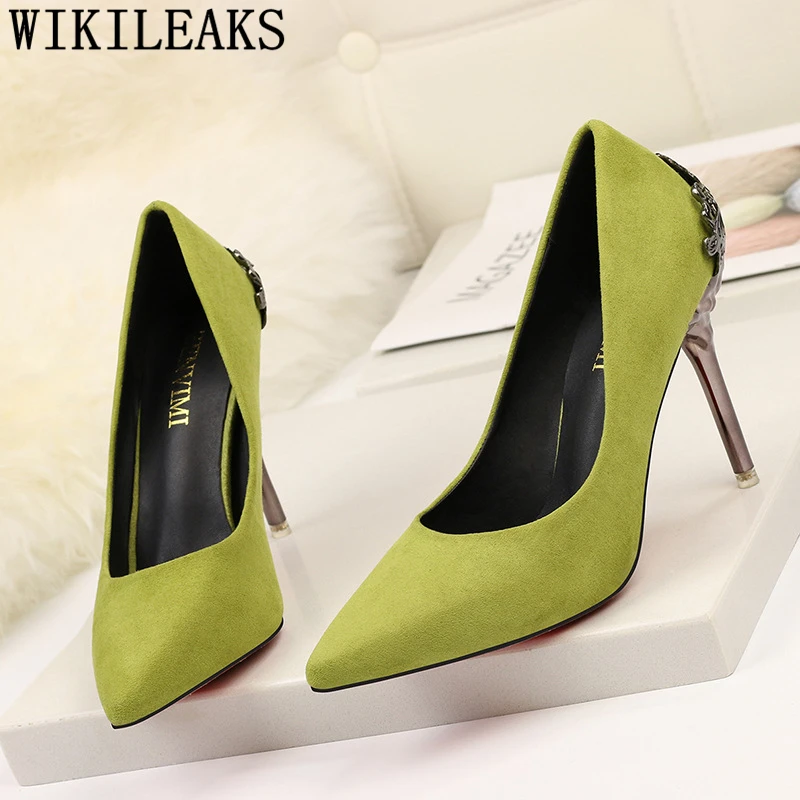 black pumps with gold heels