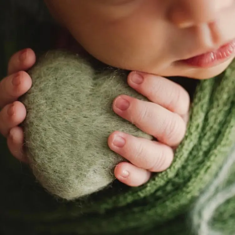 newborn photography heart-shaped