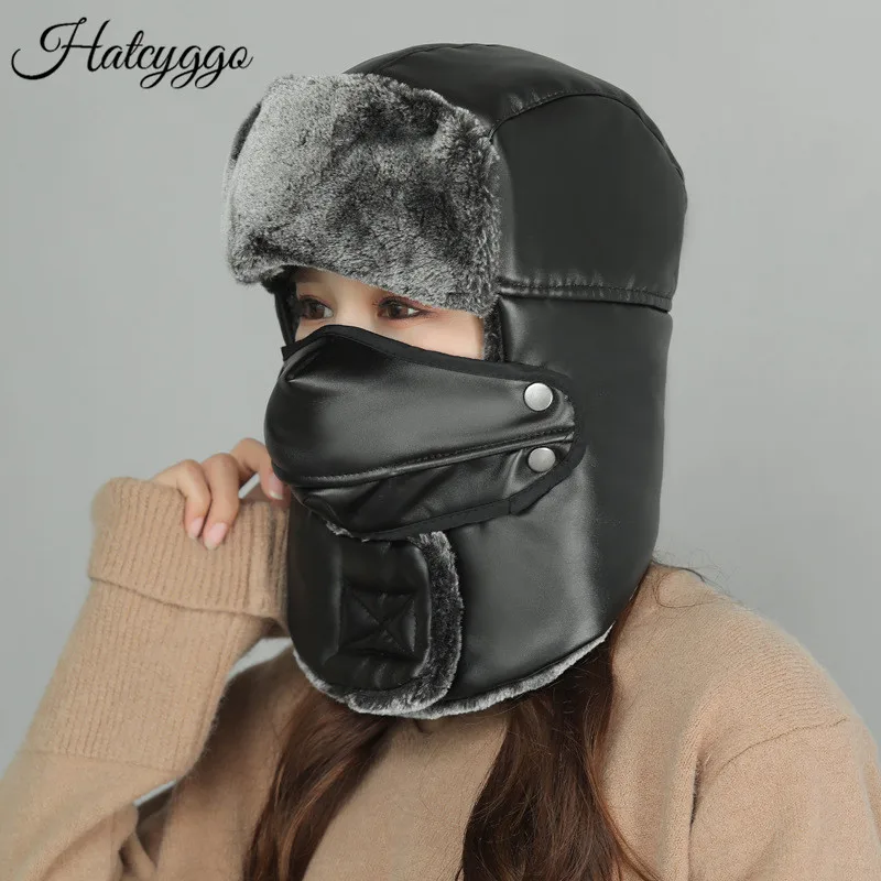 

Hatcyggo Men Women Bomber Hats Bomber Faux Leather Fur Snow Ski Cap Winter Plush Earflap Trapper Pilot Hat Black Russian Ushanka
