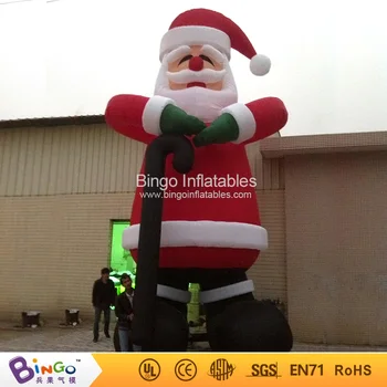 

Promotional 8M high inflatable Santa Claus with a stick for Christmas party decoration Father Christmas toys for advertising