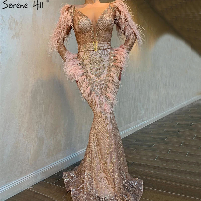 rose gold dress with feathers