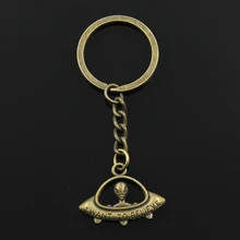 LLavero de Metal con forma de OVNI Alien, joyería antigua bronce, Color plateado, colgante de 23x30mm, 3cm