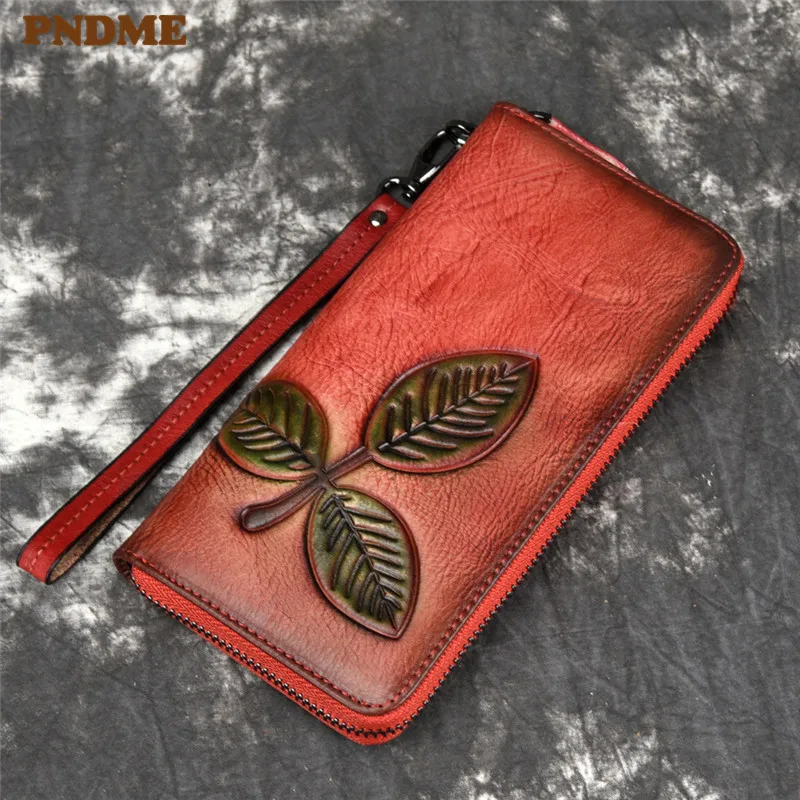 

PNDME retro handmade embossed genuine leather long ladies wallet flower cowhide female zipper phone bag card purse for women