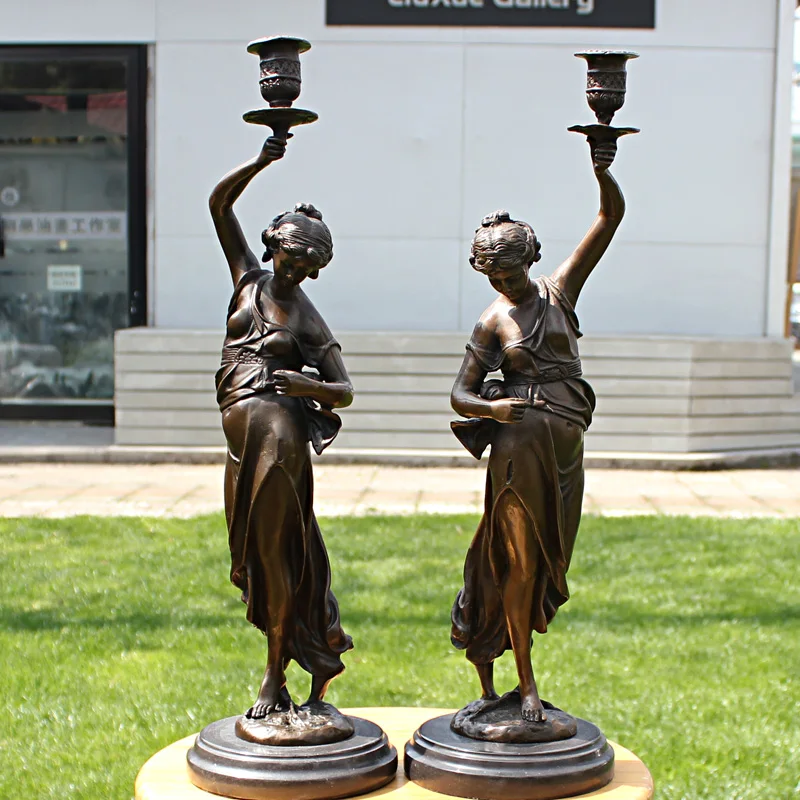 

The maid of copper bronze sculpture crafts like Candlestick furnishings decorations Home Furnishing business gifts.