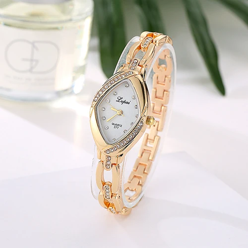 

Women Rhinestone Hollow Band Diamond Dial Quartz Analog Bracelet Wrist Watch