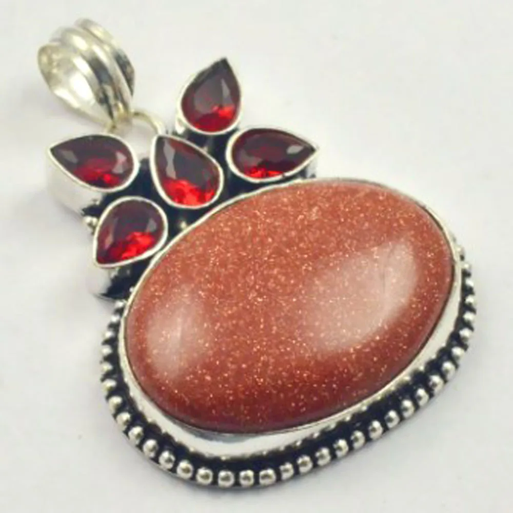 

Sun Stone & Garnets Pendant Silver Overlay over Copper, Total Length: 50mm , P3783