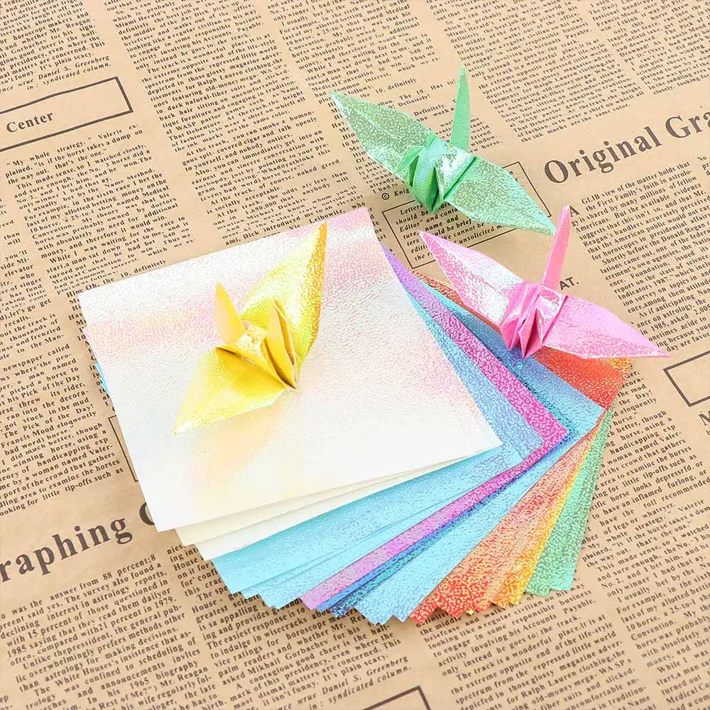 

Hot Sale 50pcs/pack DIY New Beautiful Colorful Shiny Star Animal Origami Boat Lucky Bird Folding Paper Sparkling Glitter Paper