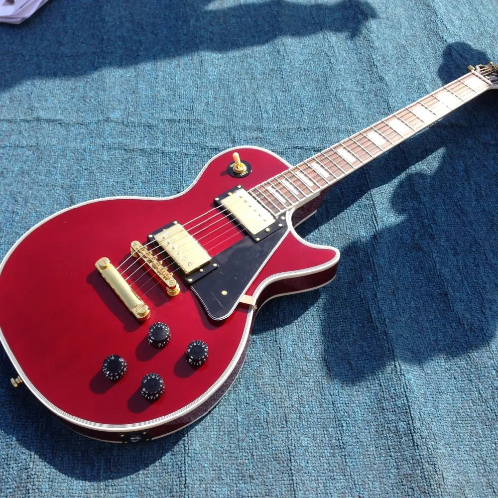

Free shipping LP custom electric guitar Apple red color ,gold hardware