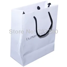 Изготовленный на заказ напечатанный бумажный мешок подарка логотипа/Recyclable упаковывая белый бумажный мешок для ходить по магазинам 20x25x8 см