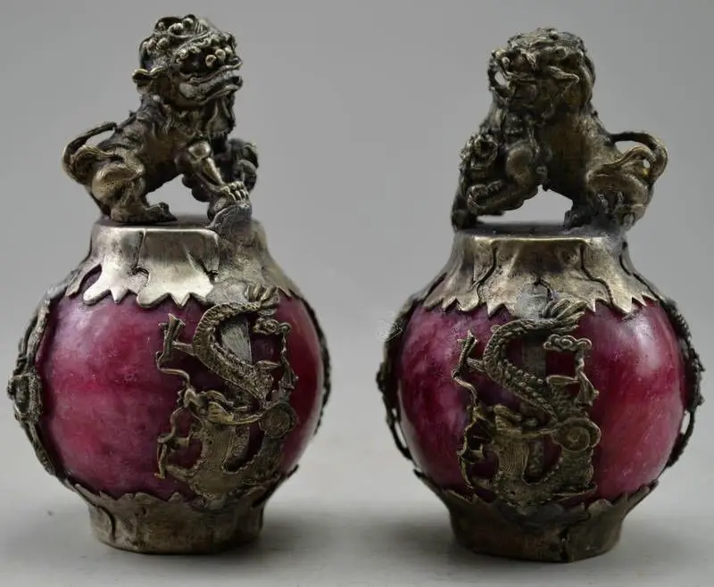 

A pair of China Miao silver dragon phoenix kirin red jade paperweight statue