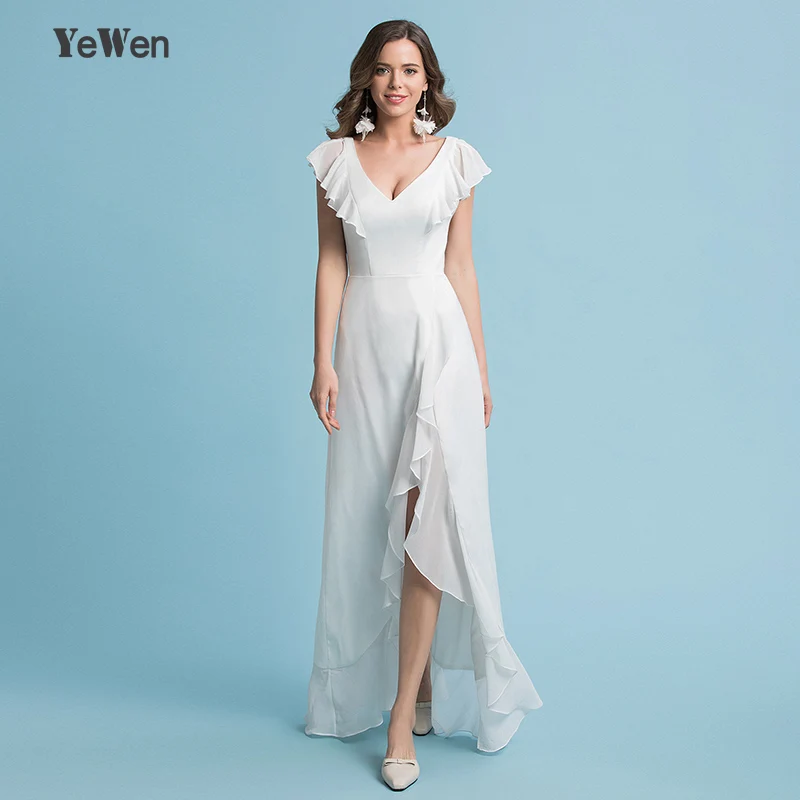 Wedding dress with long sleeves and ruffle bottom top