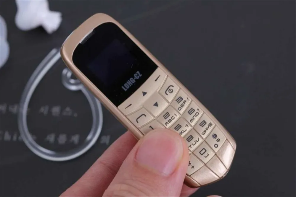 Длинный-CZ J8 bluetooth Dialer Мини Мобильный телефон 0,66 дюймов с поддержкой громкой связи fm-радио, микро сим-карта, сеть GSM