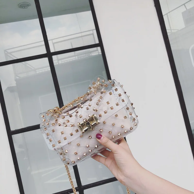 

2019 Spring and summer new rivet transparent bag beach jelly bag senior sense chain single shoulder oblique span package