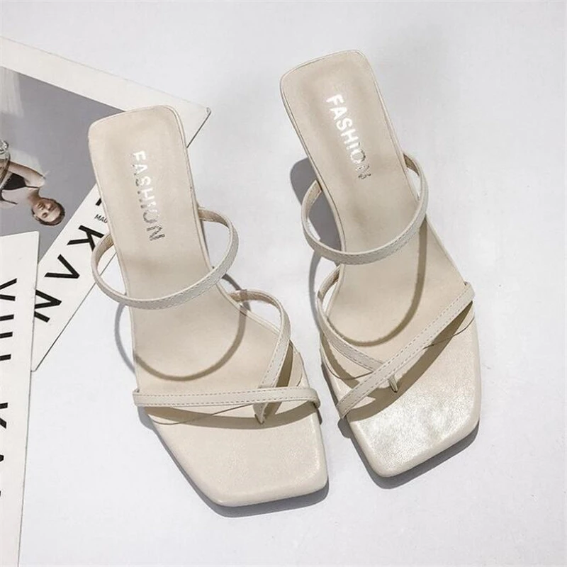 white slip on sandals