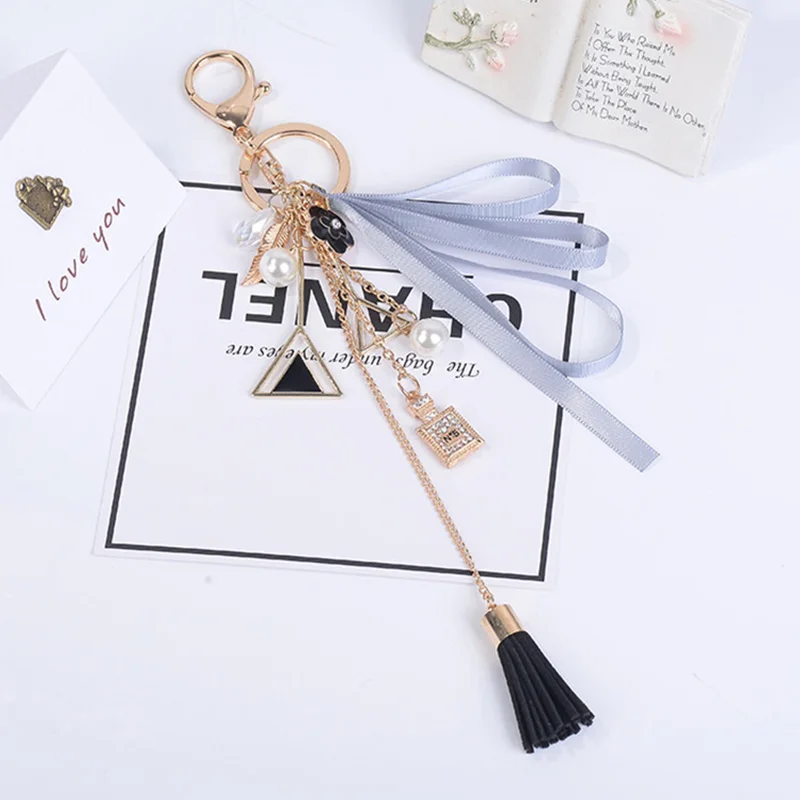 

Fashion Leaves Flower Key Ring Chains Holder Leather Tassel Bag Buckle Pendant For Car Keyrings Pearl Beads KeyChains Jewelry