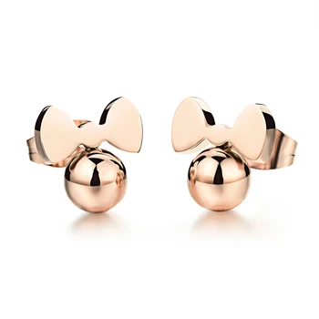 

Elegant Girl Accessories with Elected Rose Gold Earrings and Delicate Butterfly Tie Earrings lady