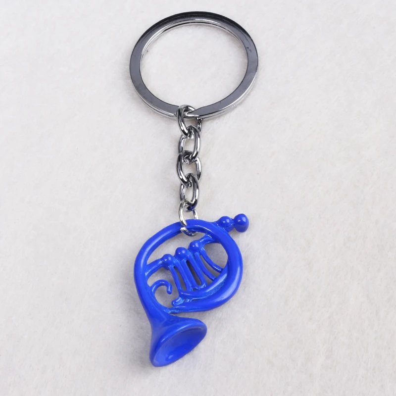 

SG How I Met Your Mother Keychain The Blue French Horn and Yellow Umbrella Pendant with silver chain Alice in wonderland Keyring