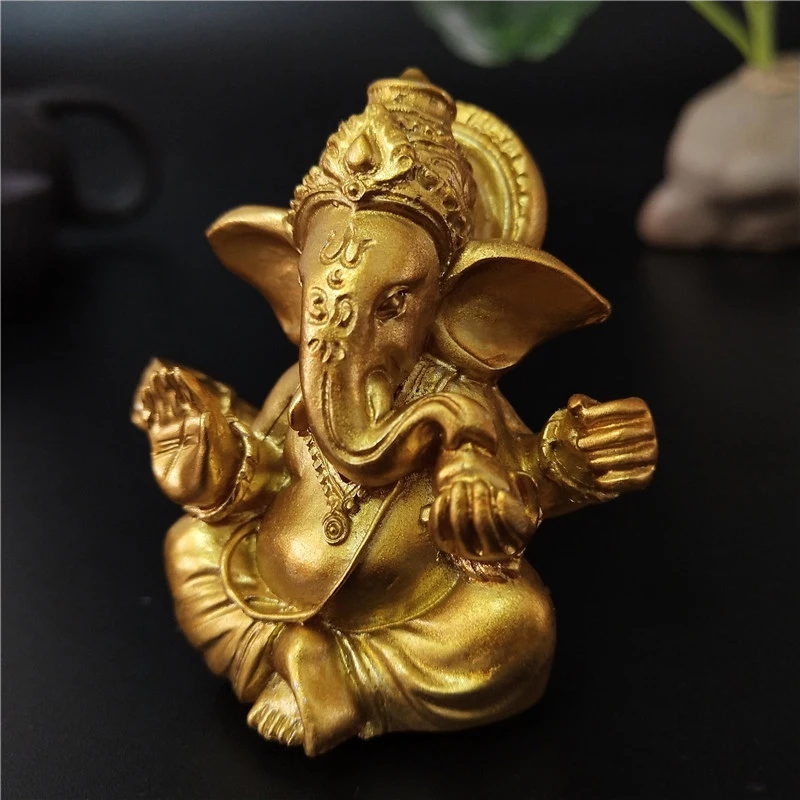 Gold Ganesha Elephant God Statue - Elegant Home and Garden Decor Piece