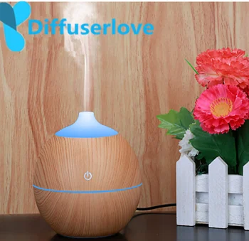 

Diffuserlove 130ml Humidifier USB Aroma Essential Oil Diffuser Mist diffuser Wood grain 7 Color Change LED light for Office Home