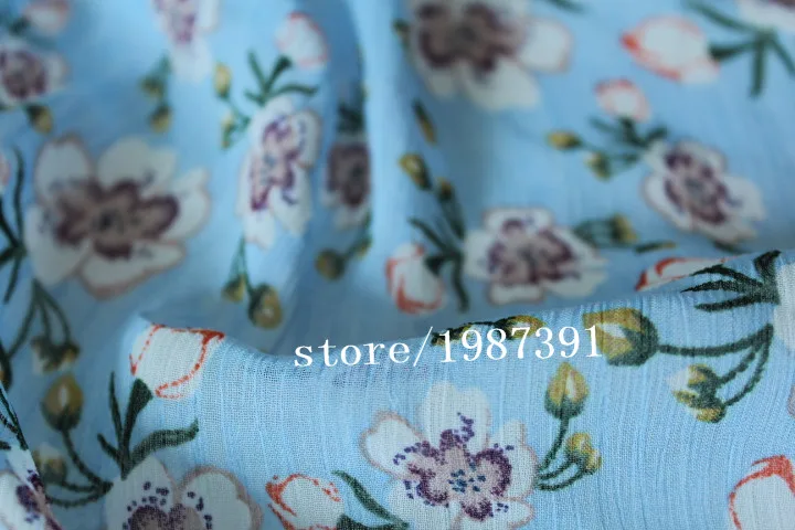 

150cm width Chiffon crepe fabric flowers pattern blue background can see through for skirt suit-dress headband CH-8126