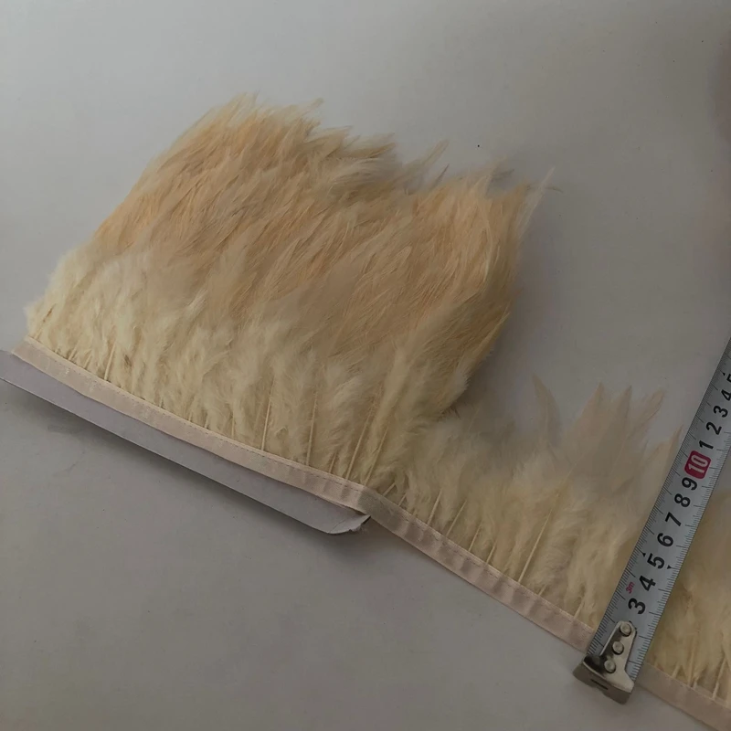 

Hot Sales 10yard Champagne Chicken Cock Feathers Trim Cloth Sideband Chicken Fringe Clothing Wedding Decoration 10-15CM width