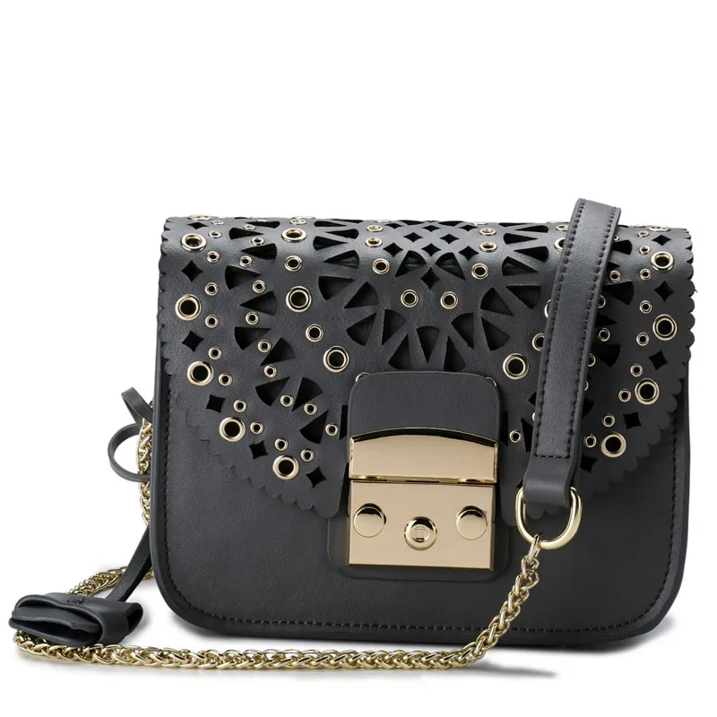Women's fashion personality hollow lock Messenger bag Korean version of the vertical square shoulder leather small bag