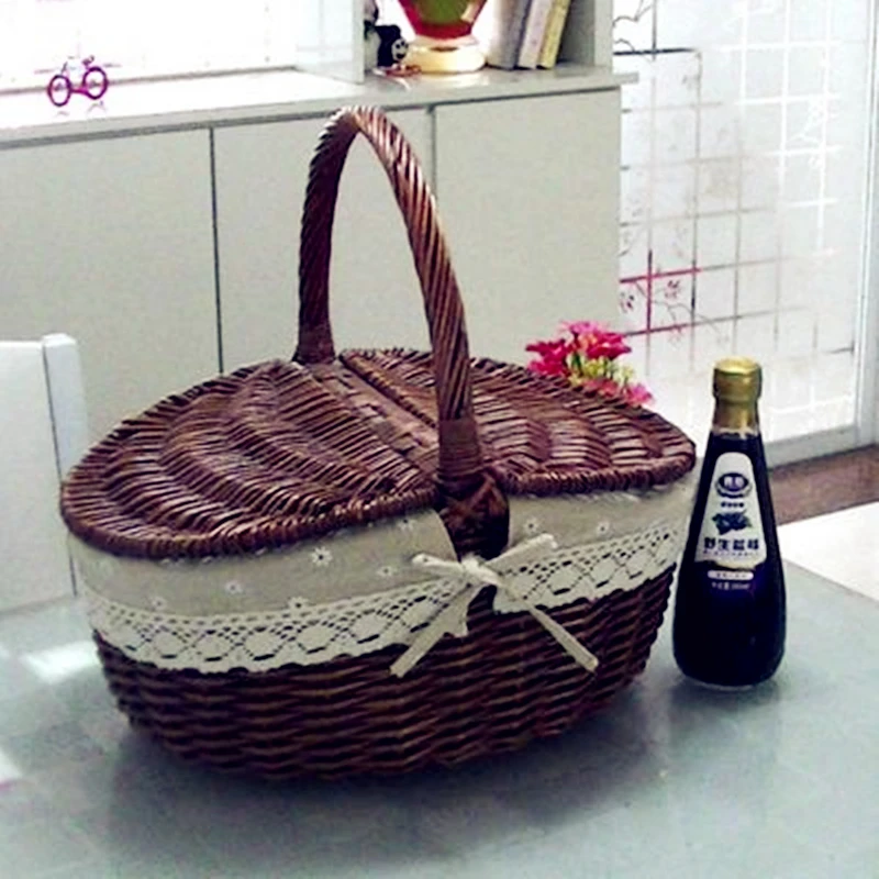 

2017 Creative manual cane Fruit and vegetable basket gift rattan basket wine picnic basket stoage bins