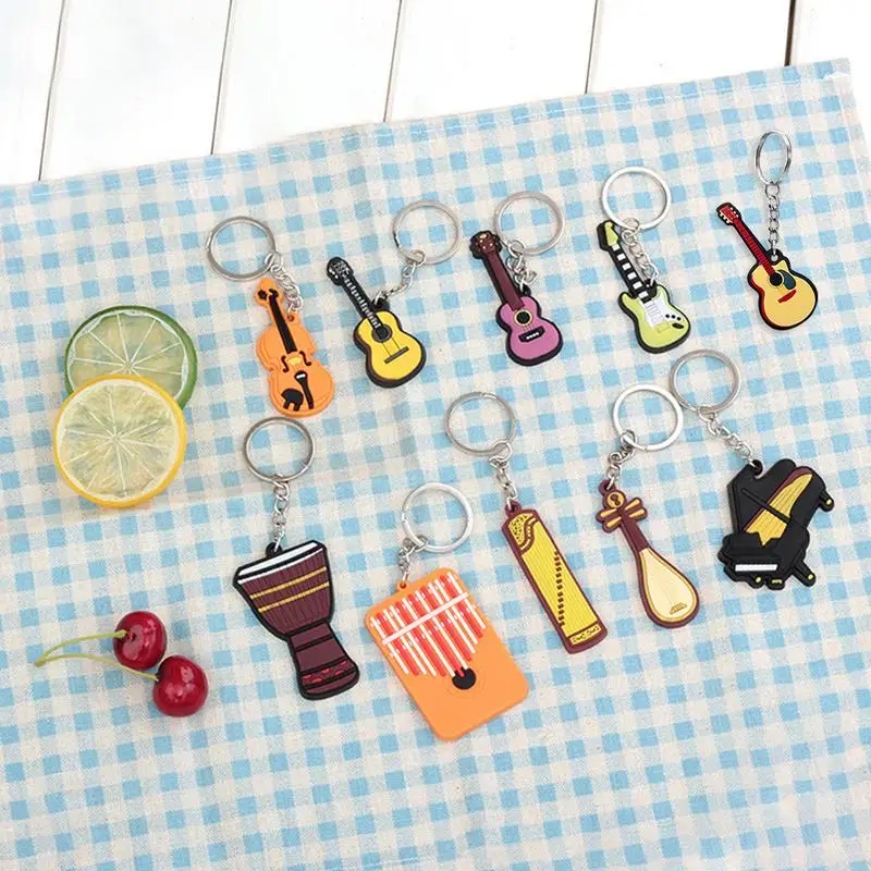 

Personalized Design Mini Creative Musical Instrument Drum Keychain Guitar Ukulele Guzheng Kalimba Piano Pendant Drop Shipping