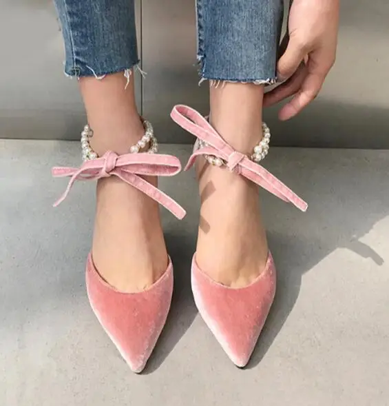 pink velvet heels with pearls