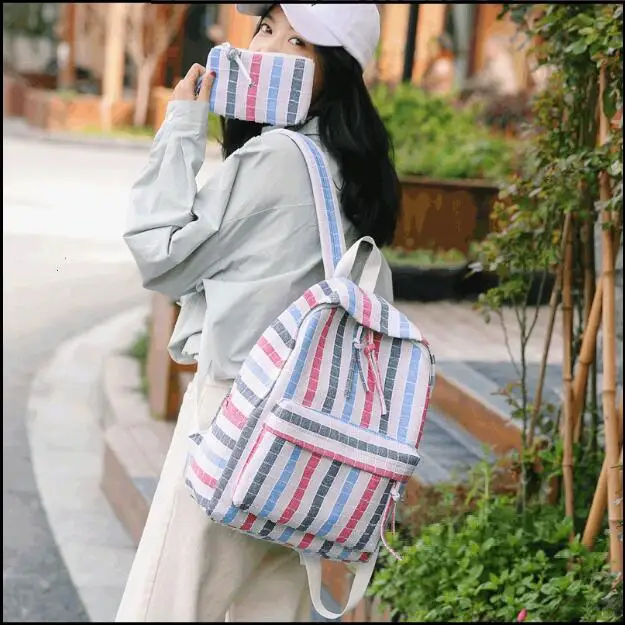 

Canvas bag backpack fresh high school student bag female Korean version of Harajuku Mori girl striped backpack