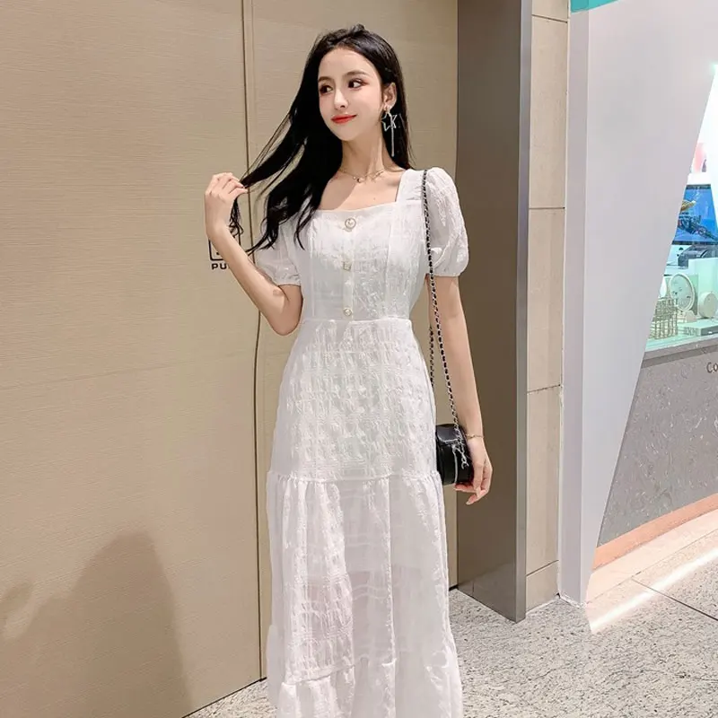 

French summer 2019 new women's clothes short sleeved square collar waist button decoration white dress puff sleeve pleated dress