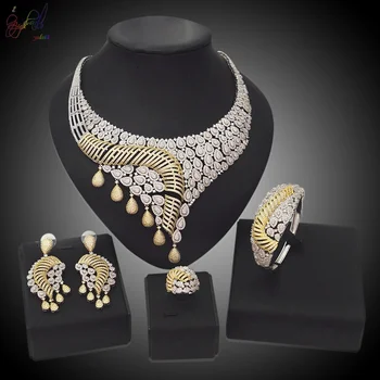 شراءYulaili حار خداع حماية البيئة النحاس أمريكا القلب والسهام الزركون الذهب والأبيض مزدوج اللون الطبيعي طقم مجوهرات